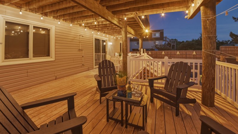 Sand Ease – Covered Deck (Night Shot)